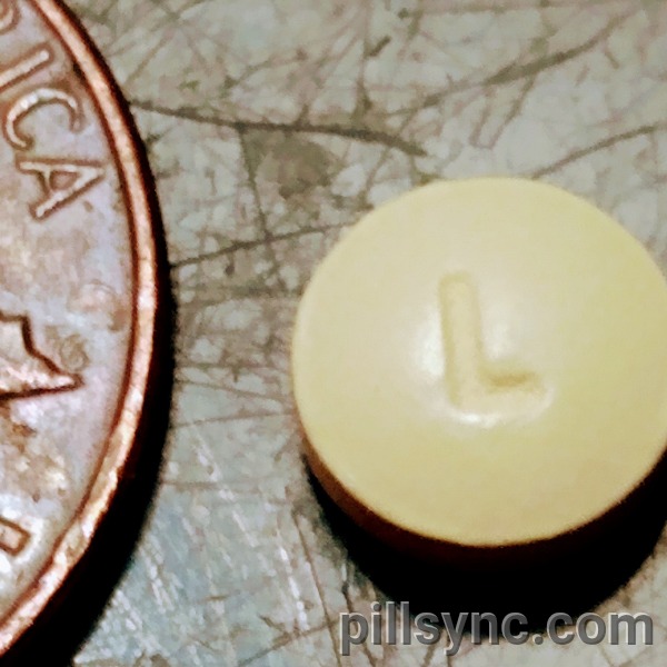 ORANGE ROUND L aspirin enteric coated low dose aspirin tablet coated